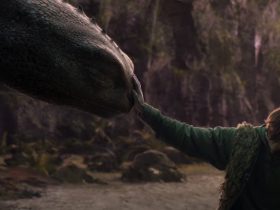 Hiccup puts his hand on Toothless's face in the live-action How to Train Your Dragon movie