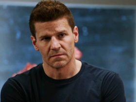 Seeley Booth stands in a hospital waiting room looking concerned