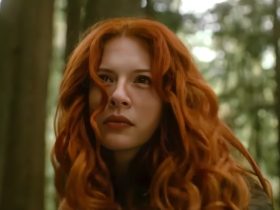 Rachelle Lefevre as Victoria in Twilight: New Moon standing in the woods