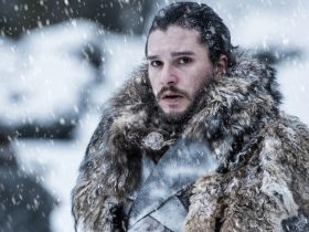 Kit Harington as Jon Snow, standing in the snow, getting snowed on, in Game of Thrones