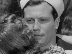 A close-up on Harold Russell's Homer as he's embraced by his wife, played by Cathy O'Donnell, in The Best Years of Our Lives