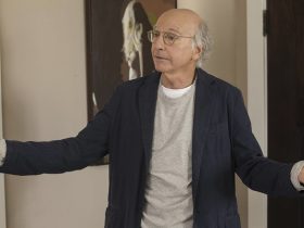 Larry David with his arms spread in Curb Your Enthusiasm