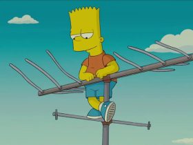 Bart Simpson standing on a rooftop TV antenna