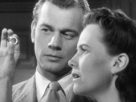 Teresa Wright examines Joseph Cotten's gift of a ring in Shadow of a Doubt