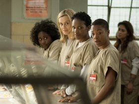 The cast of Orange is the New Black at the lunch line in prison