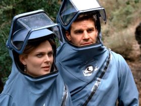 Emily Deschanel and David Boreanaz don hazmat suits in Bones