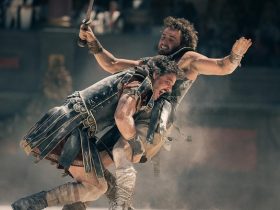 Marcus (Pedro Pascal) tackles Lucius (Paul Mescal) in Gladiator II