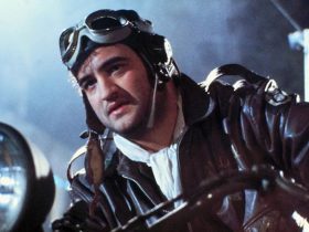 John Belushi as Captain Wild Bill Kelso astride a motorcycle in 1941