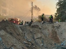 Lebanon Rescuer Picks Up "Pieces" Of Father After Israel Strike